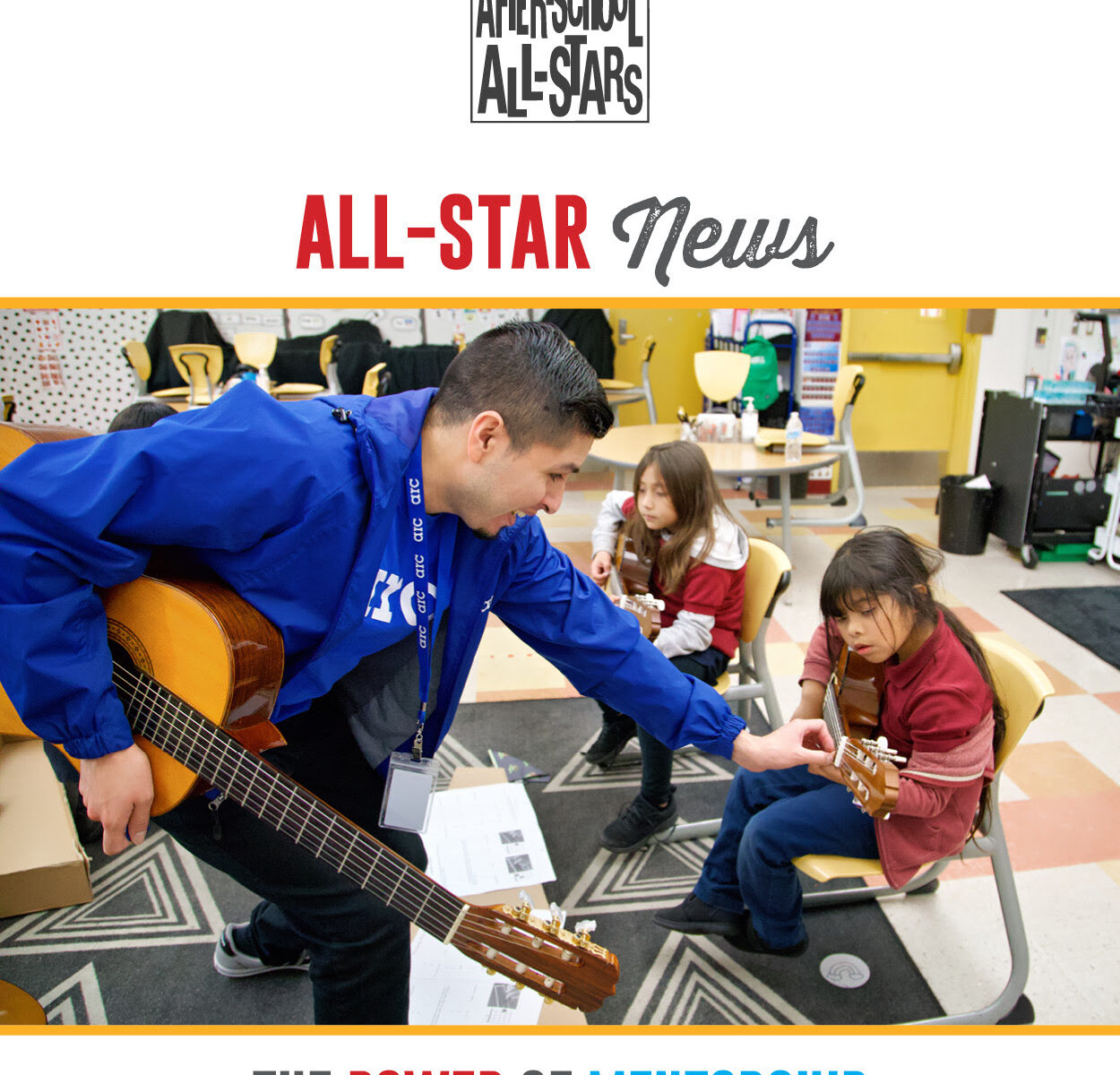 Mentor helps student tune guitar